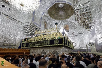 اهتزاز پرچم عزای گنبد بارگاه منور رضوی در کاظمین 10