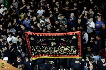 اهتزاز پرچم عزای گنبد بارگاه منور رضوی در کاظمین 5