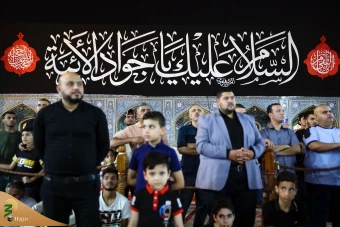 اهتزاز پرچم عزای گنبد بارگاه منور رضوی در کاظمین 15