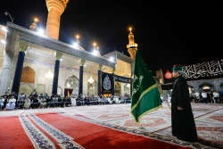 اهتزاز پرچم عزای گنبد بارگاه منور رضوی در کاظمین 11