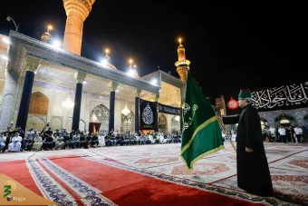 اهتزاز پرچم عزای گنبد بارگاه منور رضوی در کاظمین 11