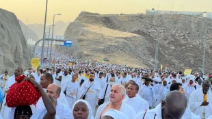 حرکت حجاج از مشعر به منا + گزارش تصویری 12