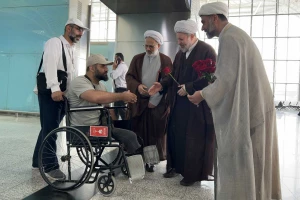 کاروان جانبازان حج تمتع وارد کشور شد + عکس