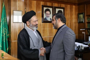 حوار وزیر الثقافة و الإرشاد الإسلامی مع رئیس الحجاج الإیرانیین بشان رحلات الحج و العمرة 2