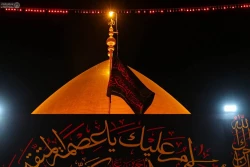 تصاویر/ بر افراشته شدن پرچم عزای گنبد حرم امام عسکری (ع) 11