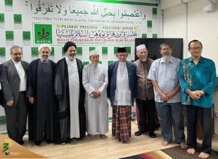 جری التشاور بشأن عقد قمة عالمیة لدعم فلسطین خلال لقاء رئیس الحجاج الإیرانیین و رئیس منظمة مابیم المالیزیة 2
