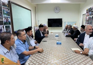 جری التشاور بشأن عقد قمة عالمیة لدعم فلسطین خلال لقاء رئیس الحجاج الإیرانیین و رئیس منظمة مابیم المالیزیة 2