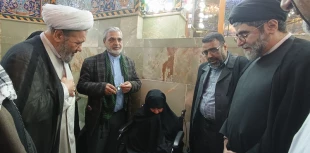 دیدار مسئول دفتر نمایندگی بعثه مقام معظم رهبری در عراق با مادر 4 شهید کرمانی در کربلای معلی 3