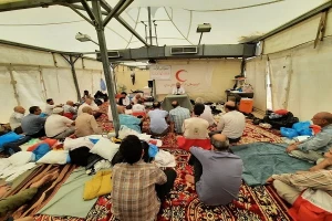 محفل انس با قرآن هلال احمر در سرزمین منا دریادبود شهدای منا