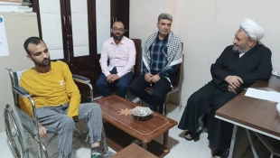 دیدار مسئول دفتر نمایندگی بعثه مقام معظم رهبری در عراق با حافظ روشن دل و معلول قرآنی