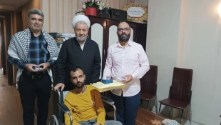 دیدار مسئول دفتر نمایندگی بعثه مقام معظم رهبری در عراق با حافظ روشن دل و معلول قرآنی
