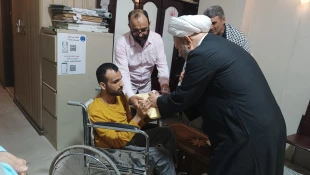 دیدار مسئول دفتر نمایندگی بعثه مقام معظم رهبری در عراق با حافظ روشن دل و معلول قرآنی