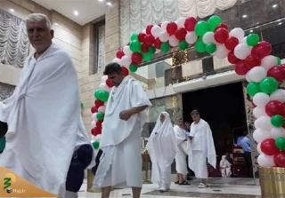 ترحيب بالمعتمرين الإيرانيين عند وصولهم مكة