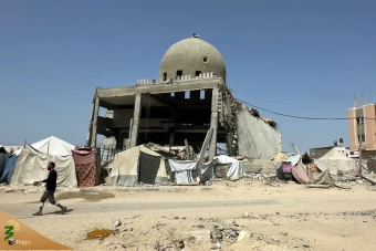  اقامه نماز جمعه در مسجد تخریب شده در شهر خان یونس 12