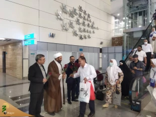 استقبال از زائران عمره مفرده در ترمینال سلام/نخستین کاروان های عمره مفرده به کشور بازگشتند 3