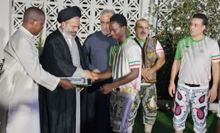 Hojjat al-Islam Navvab Meets Iran's Ambassador to Tanzania 4