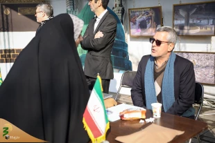 غرفه فرهنگی مجموعه حج و زیارت در راهپیمایی یوم الله ۲۲ بهمن 9