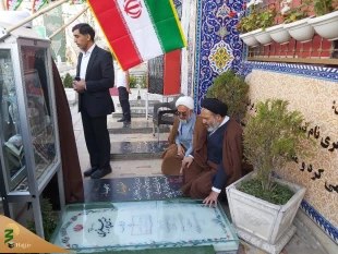 ادای احترام سرپرست حجاج ایرانی به مقام شامخ شهید سلیمانی 3