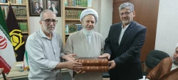 اهدای قرآن کریم خطی استاد محمدحسن برجیسیان به آستان مطهر امیرالمؤمنین (ع)