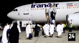 فیلم: زائران سیستان و بلوچستان با لباس احرام وارد هواپیما شدند