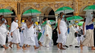 حکم ماسک زدن زنان و مردان در حال احرام چیست؟ 2