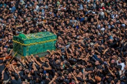 تشییع نمادین پیکر امام جواد علیه‌السلام در کاظمین 2