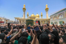 تشییع نمادین پیکر امام جواد علیه‌السلام در کاظمین 3