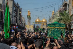 تشییع نمادین پیکر امام جواد علیه‌السلام در کاظمین 14