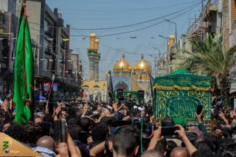 تشییع نمادین پیکر امام جواد علیه‌السلام در کاظمین 14