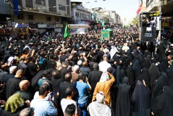 تشییع نمادین پیکر امام جواد علیه‌السلام در کاظمین 18