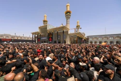 تشییع نمادین پیکر امام جواد علیه‌السلام در کاظمین 16