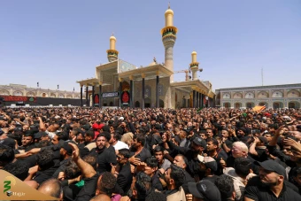 تشییع نمادین پیکر امام جواد علیه‌السلام در کاظمین 16