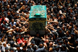 تشییع نمادین پیکر امام جواد علیه‌السلام در کاظمین 24