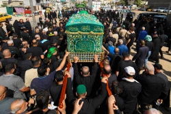 تشییع نمادین پیکر امام جواد علیه‌السلام در کاظمین 25