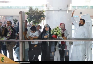 تصاویری از بازگشت اولین کاروان حاجیان ایرانی از عربستان به تهران 15