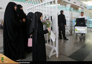 تصاویری از بازگشت اولین کاروان حاجیان ایرانی از عربستان به تهران 18