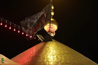 تعویض پرچم گنبد حرم امام حسین(ع)
